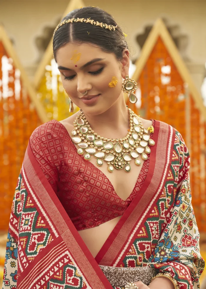 Cream and Red Patola Saree