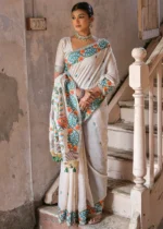 Cream and Dark Green Muga Cotton Woven Floral Saree