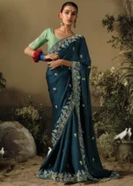 Peacock Blue Embroidered Dola Silk Saree