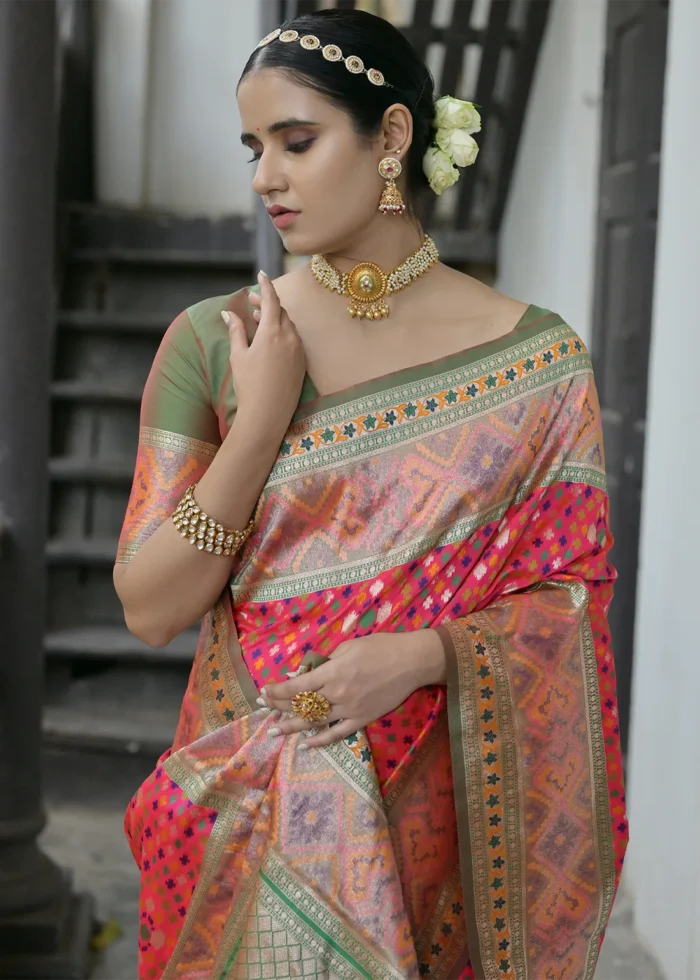 Coral Pink Patola Silk Saree with Mehndi Blouse