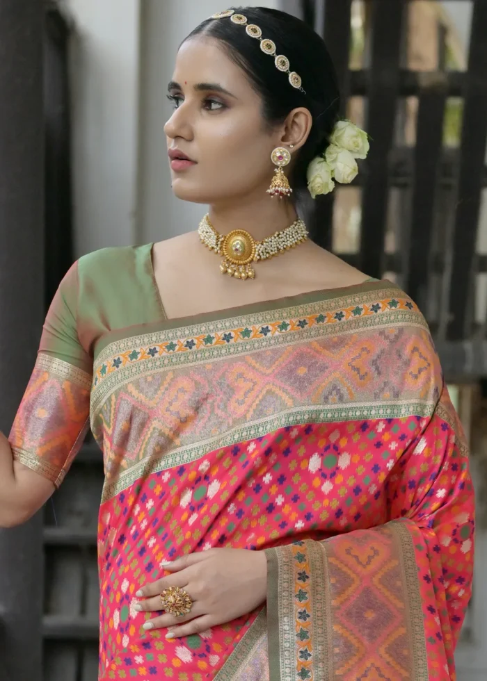 Coral Pink Patola Silk Saree with Mehndi Blouse