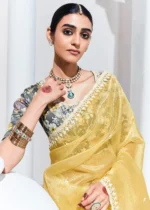 Pastel Yellow Embroidered Organza Silk Saree