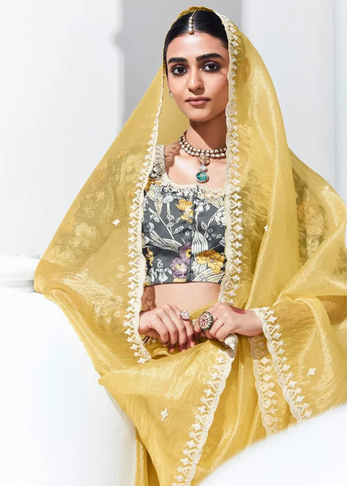 Pastel Yellow Embroidered Organza Silk Saree