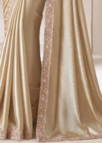 Beige Embroidered Chiffon Saree with Pink Blouse