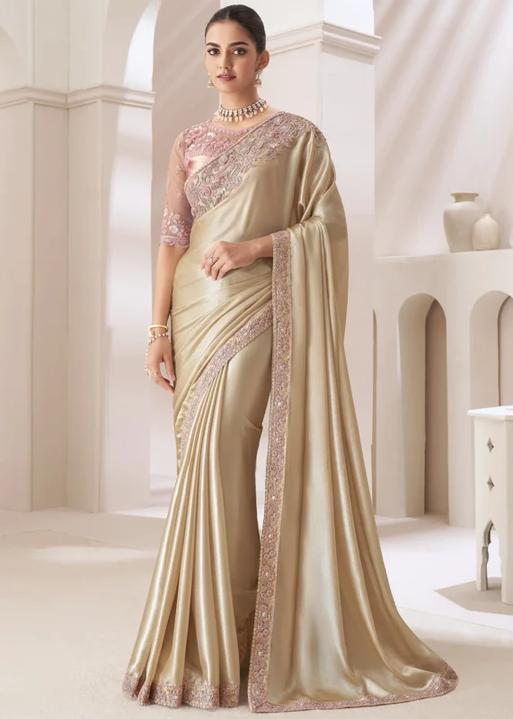 Beige Embroidered Chiffon Saree with Pink Blouse