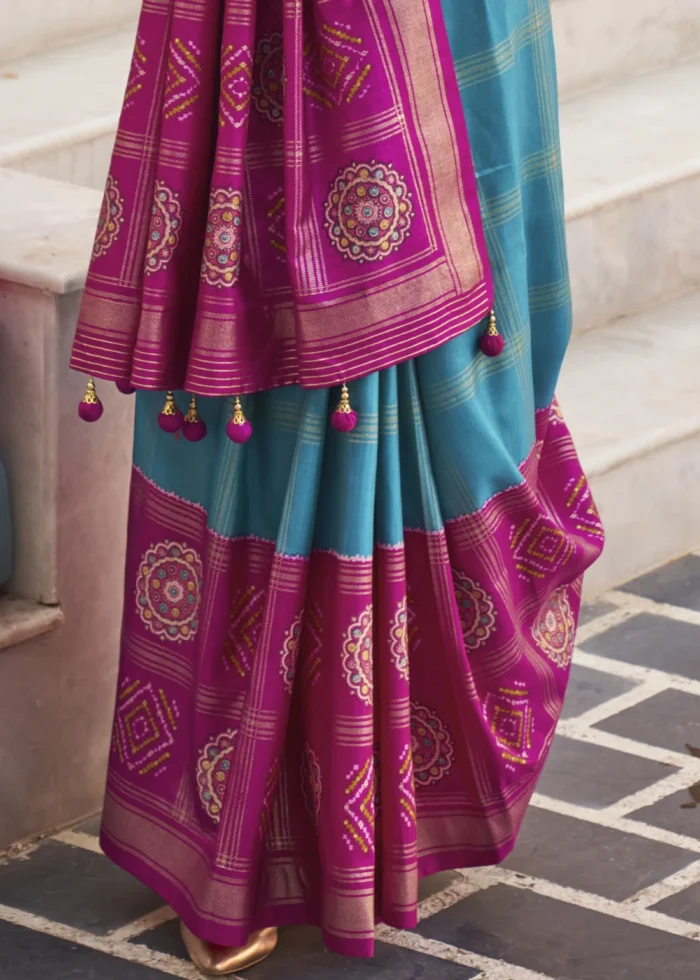 Cyan Blue Printed Patola Saree with Red Blouse