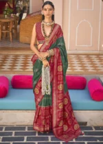 Dark Green Printed Patola Saree with Red Blouse