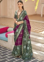 Magenta Printed Patola Saree with Green Blouse