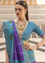 Purple Printed Patola Saree with Blue Blouse