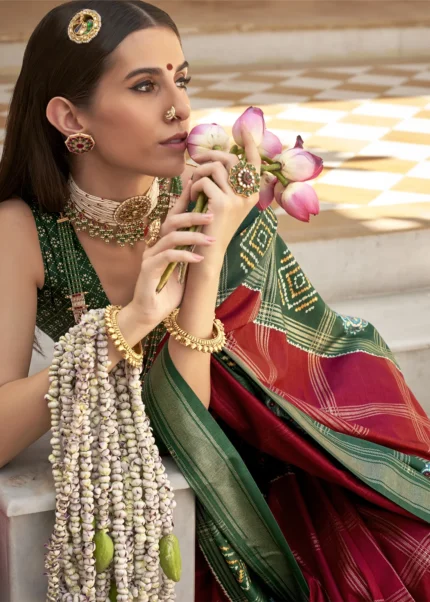 Red Printed Patola Saree with Green Blouse