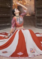 Cream and Orange Lehenga Choli with Mirror Work