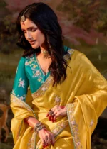 Yellow Embroidered Organza Saree with Teal Blouse