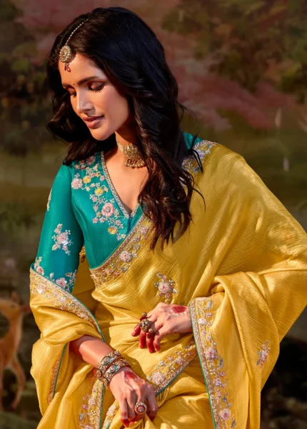 Yellow Embroidered Organza Saree with Teal Blouse