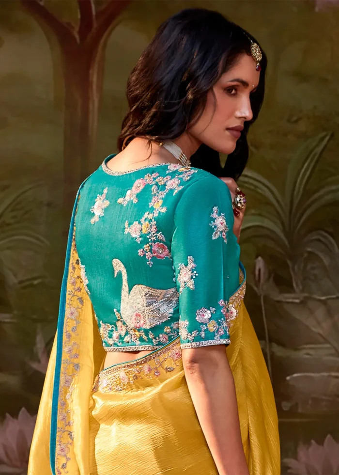 Yellow Embroidered Organza Saree with Teal Blouse