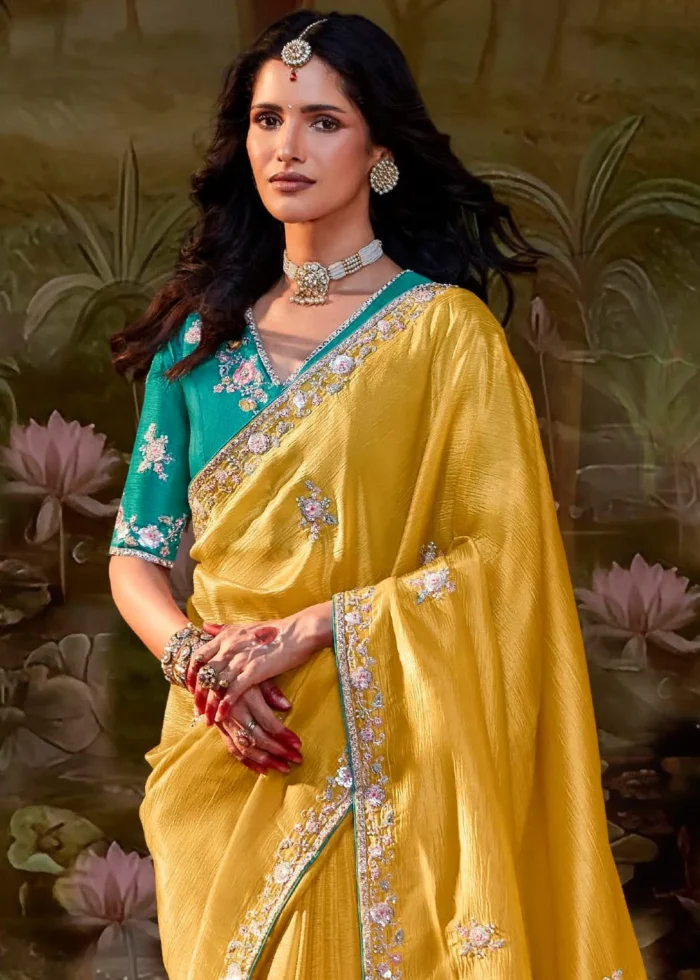 Yellow Embroidered Organza Saree with Teal Blouse