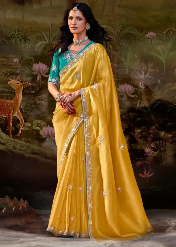 Yellow Embroidered Organza Saree with Teal Blouse